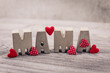 red hearts on wooden background Mama Postcard