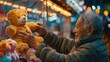 An elderly man exhibits pride and happiness while holding a large teddy bear won at a carnival game, surrounded by festive lights.
