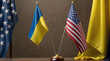 Ukrainian and US Flags on Table