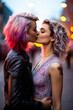 © angelo lano - Two lesbian girls in love exchange kisses outdoors with affection and love. gay LGBTQ+