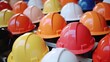 © Fotograf - Hard hats neatly arranged on a shelf, perfect for construction or safety concepts