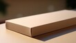 © Fotograf - A white box sitting on top of a table. Ideal for product display mockups