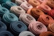 Close up of various rolls of fabric, ideal for textile or fashion design projects
