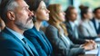 © progressman - a group of people sitting in a row