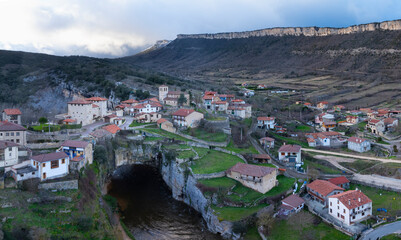 Wall Mural - Town of Puentedey in the Merindad de Valdeporres. Aerial view from a drone. The Merindades region. Burgos. Castile and Leon. Spain. Europe