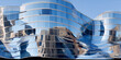 Wavy glass facade of a modern office building reflecting the cityscape, blue and silver.