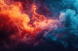 Dense multicolored smoke of  red, blue and yellow colors on a black isolated background. Background from the smoke of vape