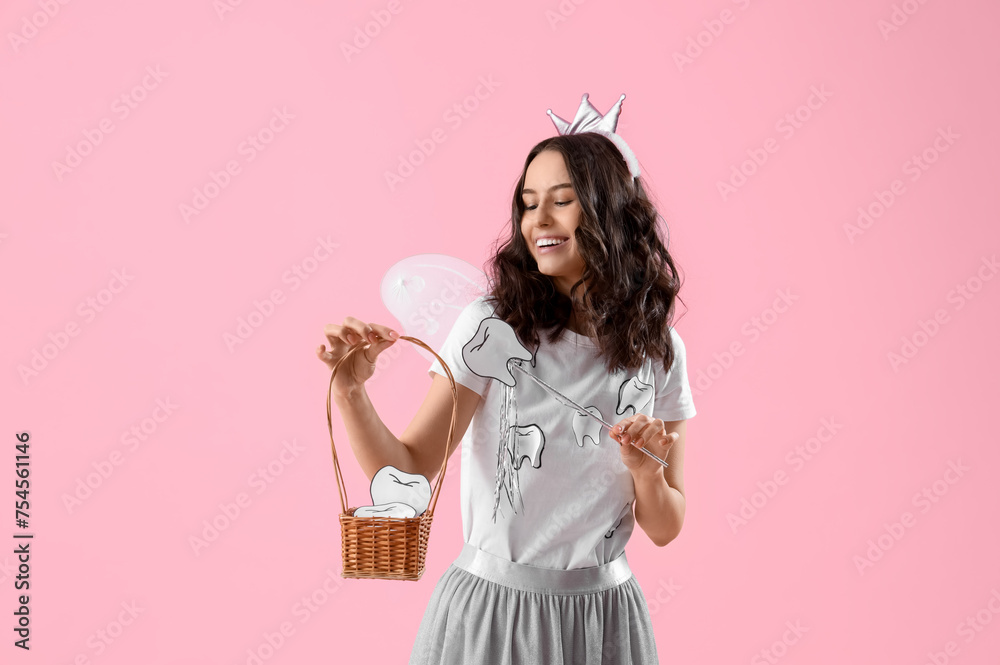 Tooth Fairy with basket and wand on pink background