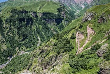 Wall Mural - View from Soviet-Georgian Friendship Memorial on Georgian Military Highway near Guduari village in northern part of Georgia