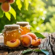 Two jars filled with peaches sitting on a wooden table