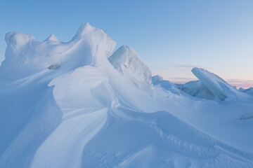 Wall Mural - winter arctic landscape. cold frosty winter weather. harsh polar climate. ice hummocks on the frozen