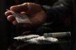 Drug addiction. Man with cocaine and rolled dollar banknote at black table, selective focus