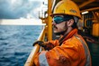 © Azhorov - A man wearing a hard hat and goggles is on a boat, possibly working on equipment or maintenance tasks. Generative AI