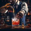 A close-up of a mixologist crafting a cocktail.
