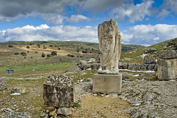 decapitated statue in the roman city of segobriga