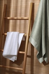 Sticker - Soft terry towels and wooden ladder indoors