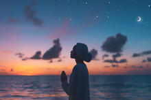 Silhouette Of Meditating Woman During Sunset, Close To The Sea
