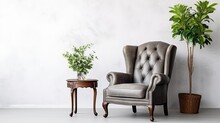 An Antique Armchair, Complemented By A Houseplant, Graces A White Wall, Illustrating Interior Design Concepts.