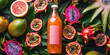 A vibrant bottle of fruit juice surrounded by an assortment of colorful exotic fruits on a dark background