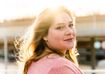 Poster - Beautiful plus size young woman outdoors - Confident chubby oversize female model strolling in the city, concepts about diversity, body acceptance and body positive