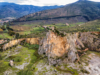 Wall Mural - Aerial view of an ancient tower on the cliff of a small hill, Tuscany, Italy