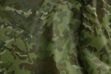 Poster - Texture of crumpled camouflage fabric as background, top view