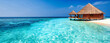 Maldivian Paradise, Overwater Bungalows Amidst Turquoise Waters, The Essence of Tropical Luxury and Romance