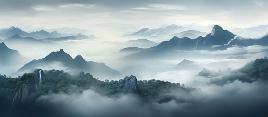 Sticker - A stunning natural landscape with mountainous landforms shrouded in fog and clouds, creating a mystical atmosphere. The horizon blends into the sky with cumulus clouds