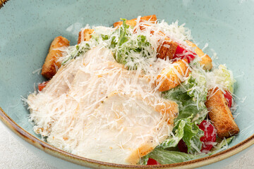 Wall Mural - Portion of gourmet caesar salad with chicken