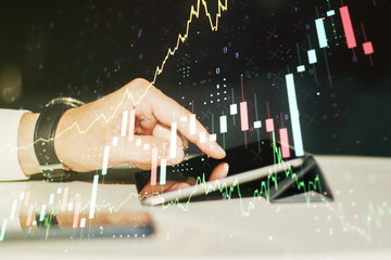 Poster - Multi exposure of abstract creative financial chart with finger presses on a digital tablet on background, research and analytics concept