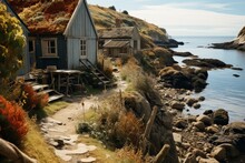 Fishermans House Surrounded By Vibrant Poppy Fields And A Pathway Leading To The Sea