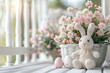 Cute easter knitted bunny and easter eggs on a white wooden shabby porch.