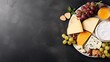 cheese plate, top view with copy space on dark table