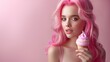 A beautiful young woman with pink hair and an alluring look eats swirled delicious ice cream