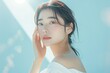 © jirayut - Young Asian beauty woman with korean makeup style, perfect clean skin on isolated blue background. Facial treatment, Cosmetology, plastic surgery.