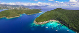 Fototapeta Na drzwi - Sivota - stunning aerial drone video of turquoise sea known as Blue Lagoon and white sandy beaches. Epirus, Greece summer holidays.