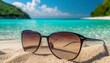 Sunglasses and tranquility on a sandy beach with turquoise water