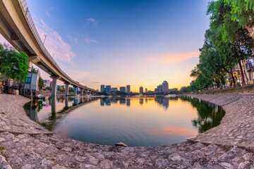 Wall Mural - Hanoi cityscape at twilight at Hoang Cau lake