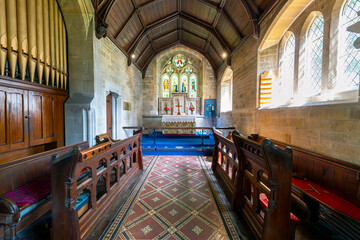 Wall Mural - Interior altar and chapel inside the medieval Parish Church of Saint Mary Lower Slaughter, in the town of Lower Slaughter, England, in the Cotswold District.