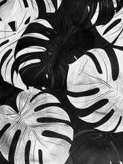  A gathering of black and white leaves in a close-up shot, showcasing textures and shapes.