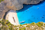 Fototapeta Tulipany - Aerial drone view of the famous Shipwreck Navagio Beach on Zakynthos island, Greece. Greece iconic vacation picture.