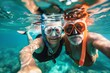 An elderly couple shares a heartwarming underwater selfie while snorkeling, celebrating a lifetime of adventures together.