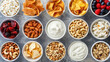Mix of snacks. Variety of snacks such as nuts, chips and popcorn.