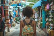 A female traveler with a backpack strolls down the bustling temple street, passing by water vendors, retail shops, and busy markets in the vibrant city
