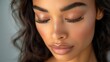 © sergiokat - full mink lashes, eyes closed woman with long wavy jet black hair, full cat eye mink lashes, full glam makeup