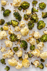 Wall Mural - Roasted cauliflower and broccoli on a sheet pan, healthy vegetable side dish