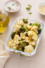 Wall Mural - Roasted cauliflower and broccoli in a meal prep container, healthy vegetable side dish