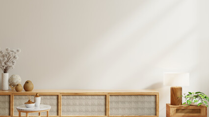 Wooden cabinet and accessories decor in living room interior on empty white wall background