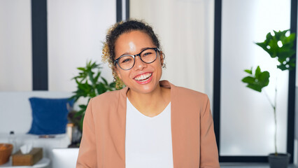 Poster - black woman talking to camera. Video calling. Online meeting.