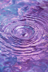 Poster - Water drop in pink and blue tone. luminous holographic style hyper realism.